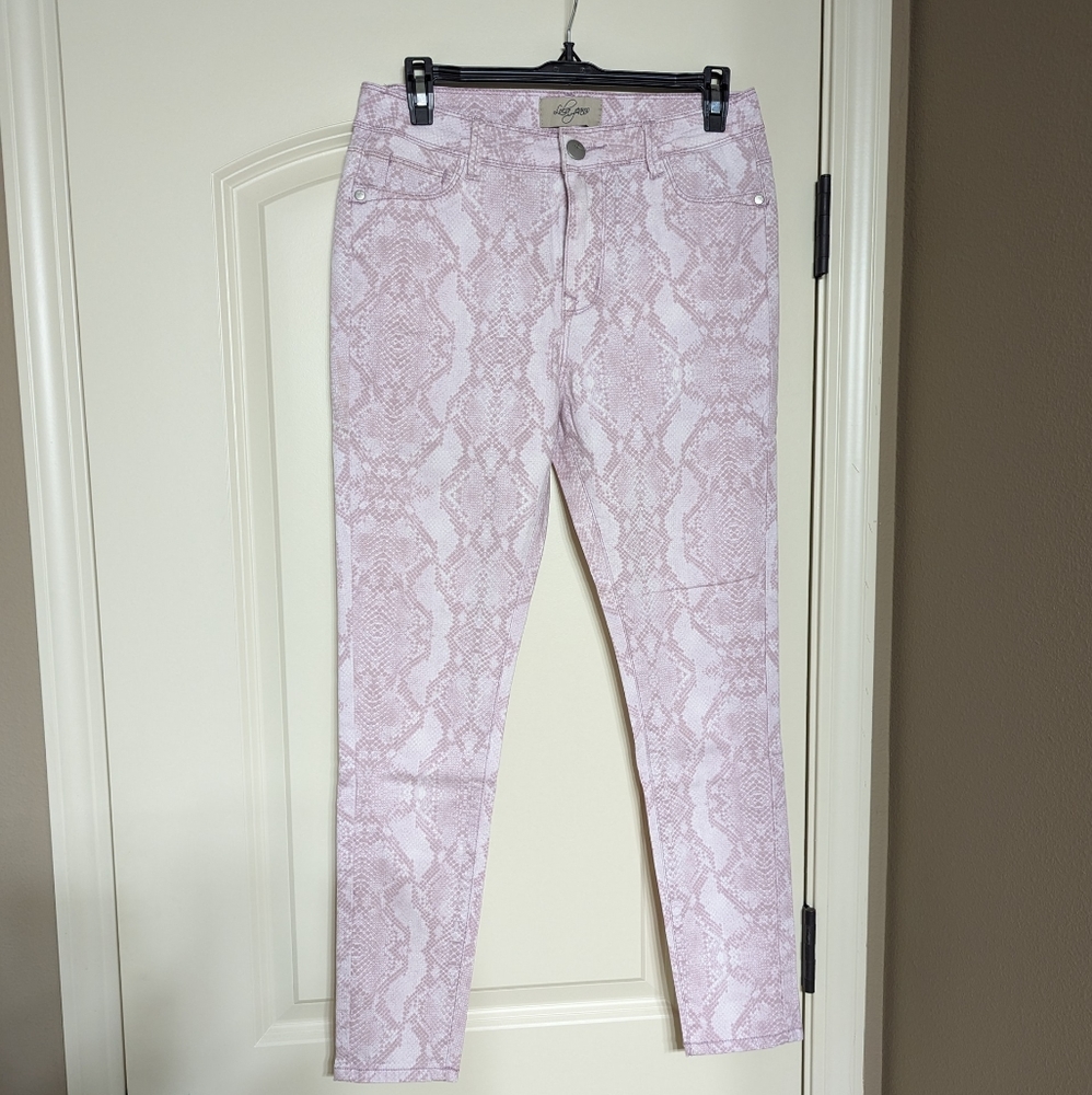 Snakeskin skinny jeans